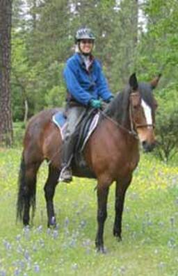 Chips and his owner enjoy the trail after improved mobility is gained using Whole Horse formulas